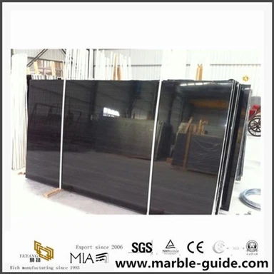 Dalle de marbre en bois noir antique naturelle pour le design de l'hôtel